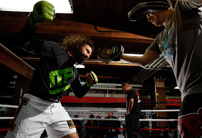 CHICAGO, IL - JANUARY 23:  Clay Guida (L) conducts an open workout session for media on January 23, 2013 at UFC Gym in Chicago, Illinois. (Photo by Josh Hedges/Zuffa LLC/Zuffa LLC via Getty Images)