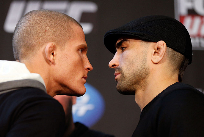 CHICAGO, IL - JANUARY 24: (L-R) Opponents Erik Koch and Ricardo Lamas face off during the UFC on FOX press conference on January 24, 2013 at the United Center in Chicago, Illinois. (Photo by Josh Hedges/Zuffa LLC/Zuffa LLC via Getty Images)