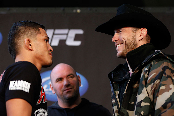 CHICAGO, IL - JANUARY 24: (L-R) Opponents Anthony Pettis and Donald "Cowboy" Cerrone face off during the UFC on FOX press conference on January 24, 2013 at the United Center in Chicago, Illinois. (Photo by Josh Hedges/Zuffa LLC/Zuffa LLC via Getty Images)