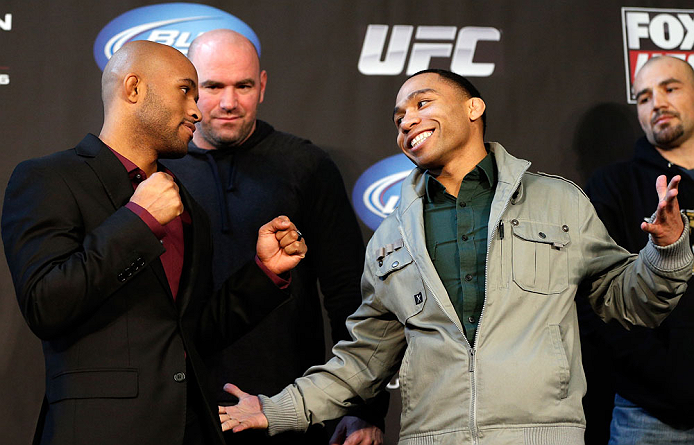 CHICAGO, IL - JANUARY 24: (L-R) Opponents Demetrious "Mighty Mouse" Johnson and John Dodson face off during the UFC on FOX press conference on January 24, 2013 at the United Center in Chicago, Illinois. (Photo by Josh Hedges/Zuffa LLC/Zuffa LLC via Getty Images)
