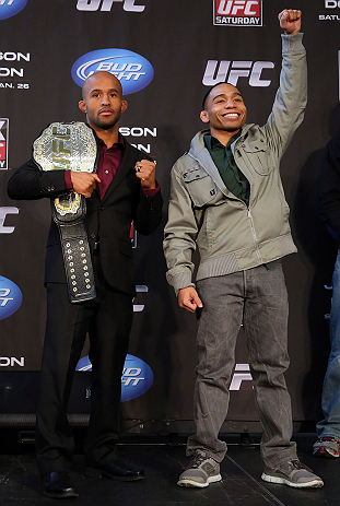 CHICAGO, IL - JANUARY 24: (L-R) Opponents Demetrious "Mighty Mouse" Johnson and John Dodson pose for photos during the UFC on FOX press conference on January 24, 2013 at the United Center in Chicago, Illinois. (Photo by Josh Hedges/Zuffa LLC/Zuffa LLC via Getty Images)