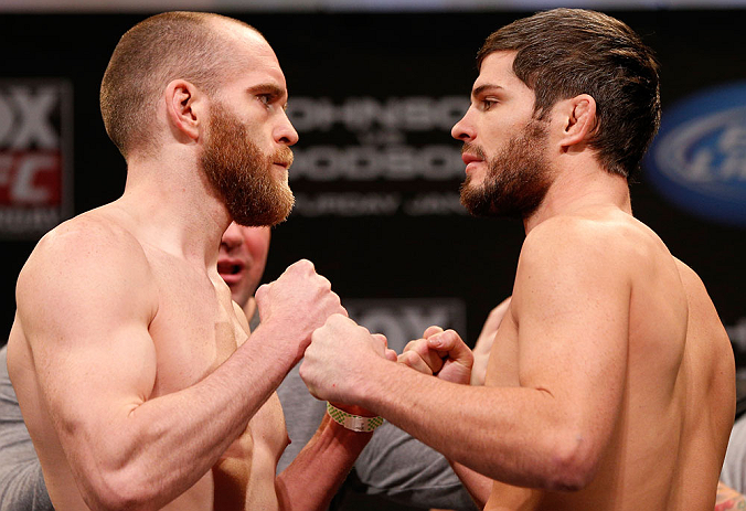 CHICAGO, IL - JANUARY 25: (L-R) Opponents T.J. Grant and Matt Wiman face off during the UFC on FOX weigh-in on January 25, 2013 at the Chicago Theatre in Chicago, Illinois. (Photo by Josh Hedges/Zuffa LLC/Zuffa LLC via Getty Images)