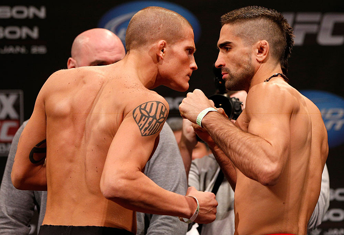 CHICAGO, IL - JANUARY 25: (L-R) Opponents Erik Koch and Ricardo Lamas face off during the UFC on FOX weigh-in on January 25, 2013 at the Chicago Theatre in Chicago, Illinois. (Photo by Josh Hedges/Zuffa LLC/Zuffa LLC via Getty Images)