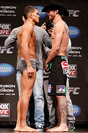 CHICAGO, IL - JANUARY 25: (L-R) Opponents Anthony Pettis and Donald "Cowboy" Cerrone face off during the UFC on FOX weigh-in on January 25, 2013 at the Chicago Theatre in Chicago, Illinois. (Photo by Josh Hedges/Zuffa LLC/Zuffa LLC via Getty Images)
