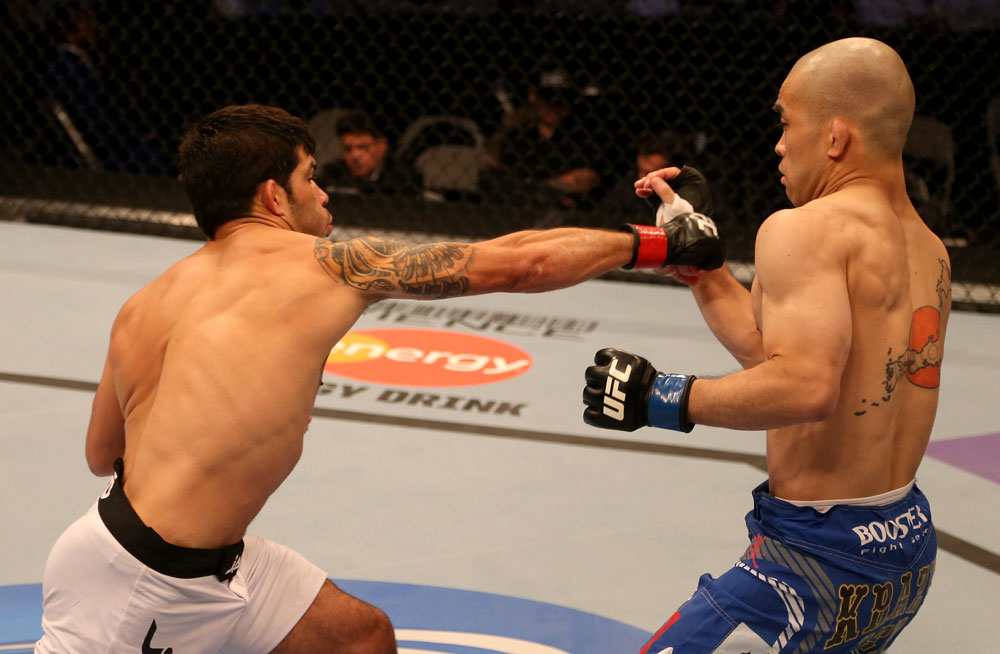 SAN JOSE, CA - JULY 11: (L-R) Raphael Assuncao punches Issei Tamura during their bantamweight bout at HP Pavilion on July 11, 2012 in San Jose, California. (Photo by Ezra Shaw/Zuffa LLC/Zuffa LLC via Getty Images) *** Local Caption *** Issei Tamura; Raphael Assuncao
