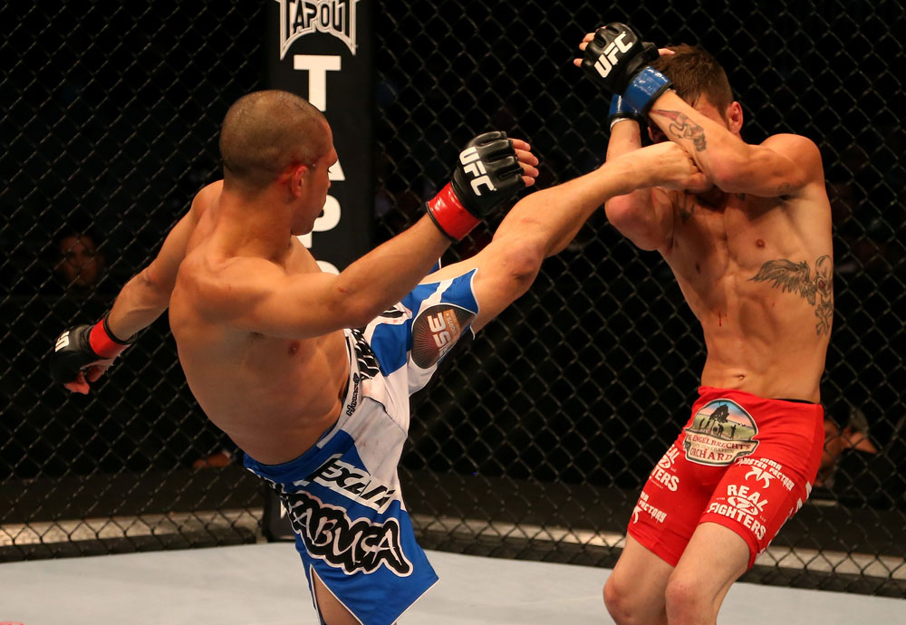SAN JOSE, CA - JULY 11: (L-R) Chris Cariaso kicks Josh Ferguson during their flyweight bout at HP Pavilion on July 11, 2012 in San Jose, California. (Photo by Ezra Shaw/Zuffa LLC/Zuffa LLC via Getty Images) *** Local Caption *** Chris Cariaso; Josh Ferguson