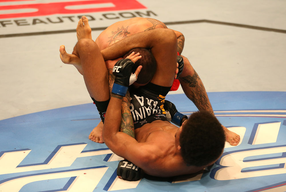 SAN JOSE, CA - JULY 11: Alex Caceres (bottom) attempts to submit Damacio Page during their bantamweight bout at HP Pavilion on July 11, 2012 in San Jose, California. (Photo by Ezra Shaw/Zuffa LLC/Zuffa LLC via Getty Images) *** Local Caption *** Damacio Page; Alex Caceres