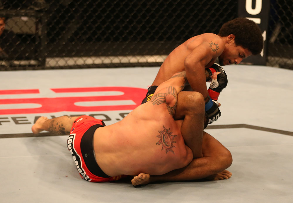 SAN JOSE, CA - JULY 11: Alex Caceres (top) attempts to submit Damacio Page during their bantamweight bout at HP Pavilion on July 11, 2012 in San Jose, California. (Photo by Ezra Shaw/Zuffa LLC/Zuffa LLC via Getty Images) *** Local Caption *** Damacio Page; Alex Caceres