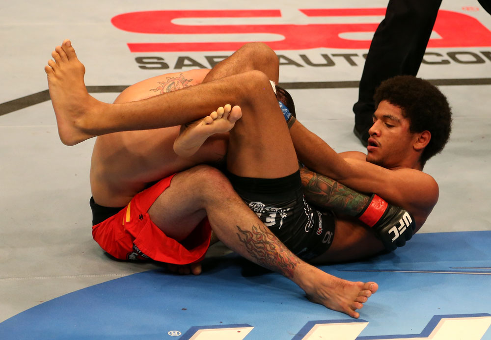 SAN JOSE, CA - JULY 11: Alex Caceres (right) attempts to submit Damacio Page during their bantamweight bout at HP Pavilion on July 11, 2012 in San Jose, California. (Photo by Ezra Shaw/Zuffa LLC/Zuffa LLC via Getty Images) *** Local Caption *** Damacio Page; Alex Caceres