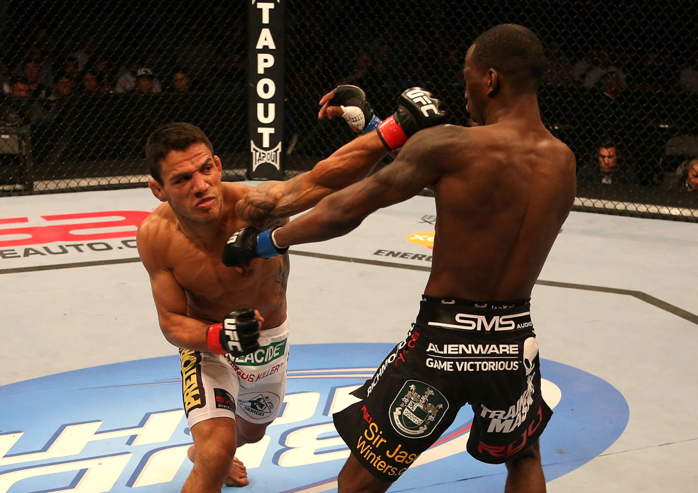 SAN JOSE, CA - JULY 11: (L-R) Rafael dos Anjos punches Anthony Njokuani during their lightweight bout at HP Pavilion on July 11, 2012 in San Jose, California. (Photo by Ezra Shaw/Zuffa LLC/Zuffa LLC via Getty Images) *** Local Caption *** Rafael Dos Anjos; Anthony Njokuani