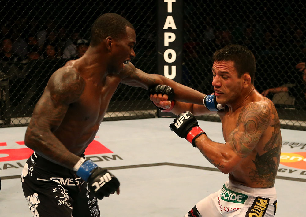 SAN JOSE, CA - JULY 11: (L-R) Anthony Njokuani punches Rafael dos Anjos during their lightweight bout at HP Pavilion on July 11, 2012 in San Jose, California. (Photo by Ezra Shaw/Zuffa LLC/Zuffa LLC via Getty Images) *** Local Caption *** Rafael Dos Anjos; Anthony Njokuani