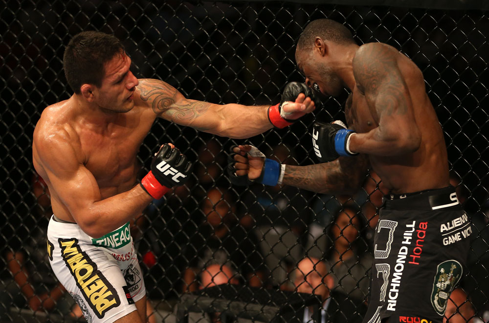 SAN JOSE, CA - JULY 11: (L-R) Rafael dos Anjos punches Anthony Njokuani during their lightweight bout at HP Pavilion on July 11, 2012 in San Jose, California. (Photo by Ezra Shaw/Zuffa LLC/Zuffa LLC via Getty Images) *** Local Caption *** Rafael Dos Anjos; Anthony Njokuani