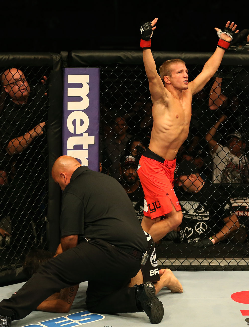 SAN JOSE, CA - JULY 11: TJ Dillashaw (red shorts) reacts to his submission victory over Vaughan Lee after their bantamweight bout at HP Pavilion on July 11, 2012 in San Jose, California. (Photo by Ezra Shaw/Zuffa LLC/Zuffa LLC via Getty Images) *** Local Caption *** T.J. Dillashaw