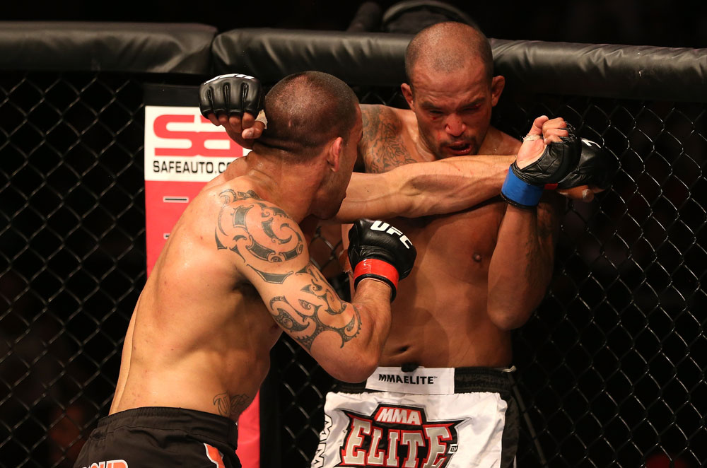 SAN JOSE, CA - JULY 11: (L-R) James Te Huna punches Joey Beltran during their light heavyweight bout at HP Pavilion on July 11, 2012 in San Jose, California. (Photo by Ezra Shaw/Zuffa LLC/Zuffa LLC via Getty Images) *** Local Caption *** James Te Huna; Joey Beltran