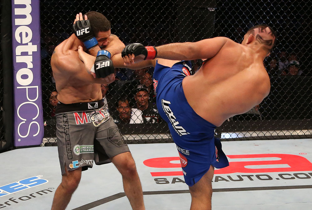 SAN JOSE, CA - JULY 11: (R-L) Mark Munoz kicks Chris Weidman during their middleweight bout at HP Pavilion on July 11, 2012 in San Jose, California. (Photo by Ezra Shaw/Zuffa LLC/Zuffa LLC via Getty Images) *** Local Caption *** Mark Munoz; Chris Weidman