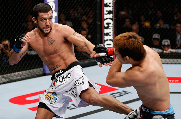 MACAU, MACAU - NOVEMBER 10: (L-R) Tom DeBlass kicks Riki Fukuda during their middleweight bout at the UFC Macao event inside CotaiArena on November 10, 2012 in Macau, Macau. (Photo by Josh Hedges/Zuffa LLC/Zuffa LLC via Getty Images)