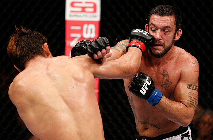 MACAU, MACAU - NOVEMBER 10: (L-R) Riki Fukuda and Tom DeBlass trade punches during their middleweight bout at the UFC Macao event inside CotaiArena on November 10, 2012 in Macau, Macau. (Photo by Josh Hedges/Zuffa LLC/Zuffa LLC via Getty Images)