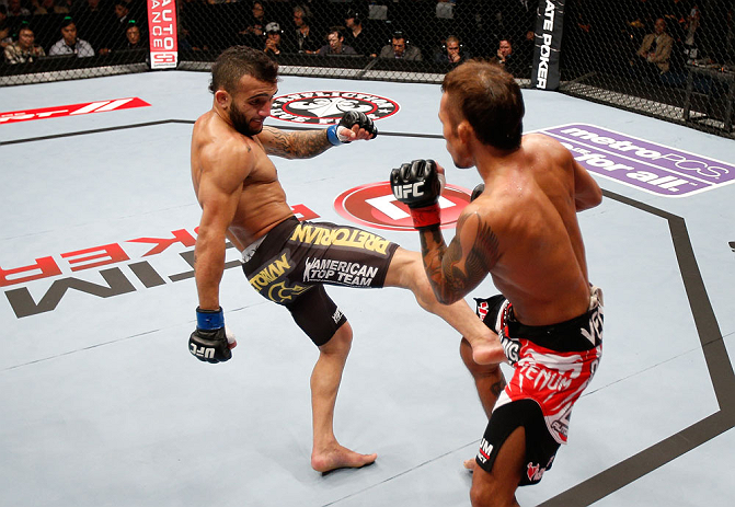 MACAU, MACAU - NOVEMBER 10: (L-R) John Lineker kicks Yasuhiro Urushitani during their flyweight bout at the UFC Macao event inside CotaiArena on November 10, 2012 in Macau, Macau. (Photo by Josh Hedges/Zuffa LLC/Zuffa LLC via Getty Images)