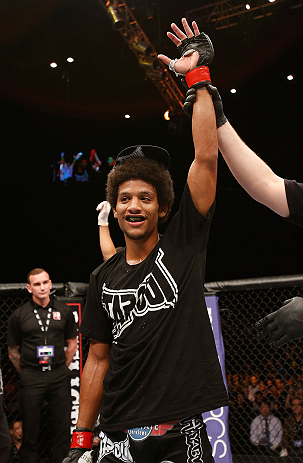 MACAU, MACAU - NOVEMBER 10: Alex Caceres reacts after defeating Motonobu Tezuka during their bantamweight bout at the UFC Macao event inside CotaiArena on November 10, 2012 in Macau, Macau. (Photo by Josh Hedges/Zuffa LLC/Zuffa LLC via Getty Images)