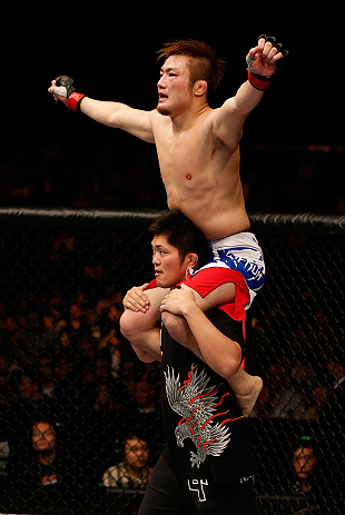 MACAU, MACAU - NOVEMBER 10: Takanori Gomi reacts after the conclusion of the third round of his lightweight bout against Mac Danzig at the UFC Macao event inside CotaiArena on November 10, 2012 in Macau, Macau. (Photo by Josh Hedges/Zuffa LLC/Zuffa LLC via Getty Images)