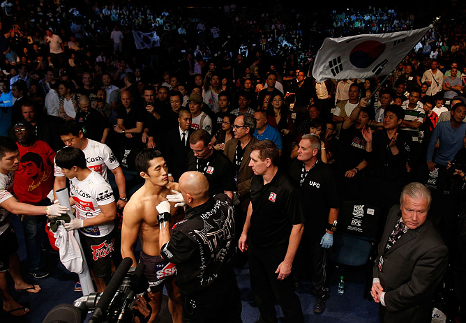 MACAU, MACAU - NOVEMBER 10: Dong Hyun Kim prepares to enter the Octagon before his welterweight bout against Paulo Thiago at the UFC Macao event inside CotaiArena on November 10, 2012 in Macau, Macau. (Photo by Josh Hedges/Zuffa LLC/Zuffa LLC via Getty Images)