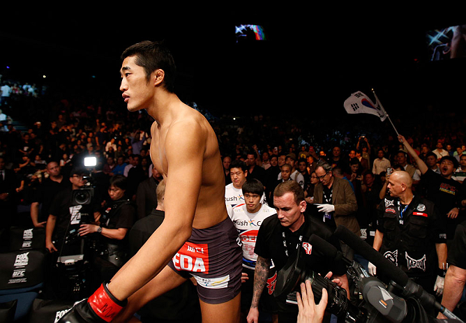 MACAU, MACAU - NOVEMBER 10: Dong Hyun Kim prepares to enter the Octagon before his welterweight bout against Paulo Thiago at the UFC Macao event inside CotaiArena on November 10, 2012 in Macau, Macau. (Photo by Josh Hedges/Zuffa LLC/Zuffa LLC via Getty Images)