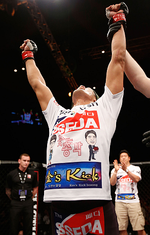 MACAU, MACAU - NOVEMBER 10: Dong Hyun Kim reacts after defeating Paulo Thiago during their welterweight bout at the UFC Macao event inside CotaiArena on November 10, 2012 in Macau, Macau. (Photo by Josh Hedges/Zuffa LLC/Zuffa LLC via Getty Images)