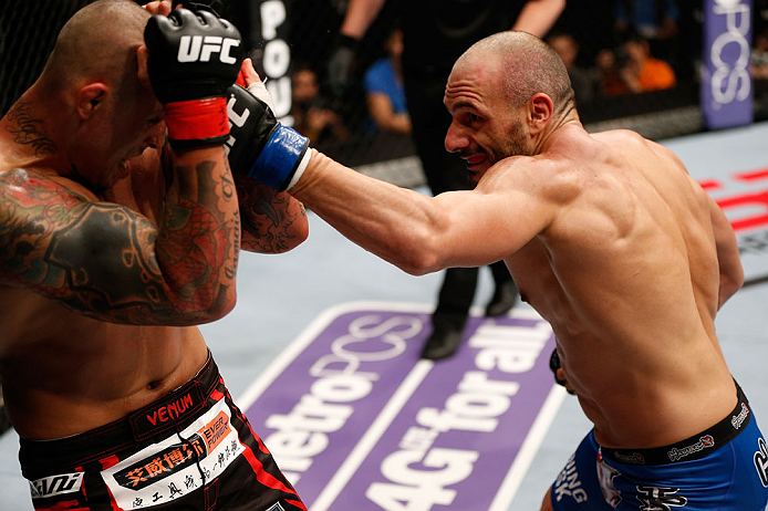 MACAU, MACAU - NOVEMBER 10: (R-L) Stanislav Nedkov punches Thiago Silva during their light heavyweight bout at the UFC Macao event inside CotaiArena on November 10, 2012 in Macau, Macau. (Photo by Josh Hedges/Zuffa LLC/Zuffa LLC via Getty Images)