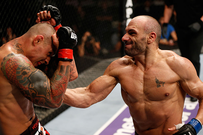 MACAU, MACAU - NOVEMBER 10: (R-L) Stanislav Nedkov punches Thiago Silva during their light heavyweight bout at the UFC Macao event inside CotaiArena on November 10, 2012 in Macau, Macau. (Photo by Josh Hedges/Zuffa LLC/Zuffa LLC via Getty Images)