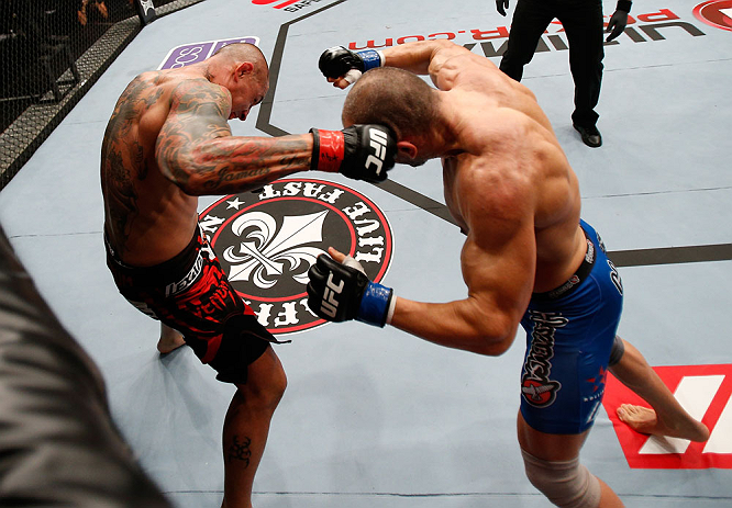 MACAU, MACAU - NOVEMBER 10: (L-R) Thiago Silva punches Stanislav Nedkov during their light heavyweight bout at the UFC Macao event inside CotaiArena on November 10, 2012 in Macau, Macau. (Photo by Josh Hedges/Zuffa LLC/Zuffa LLC via Getty Images)