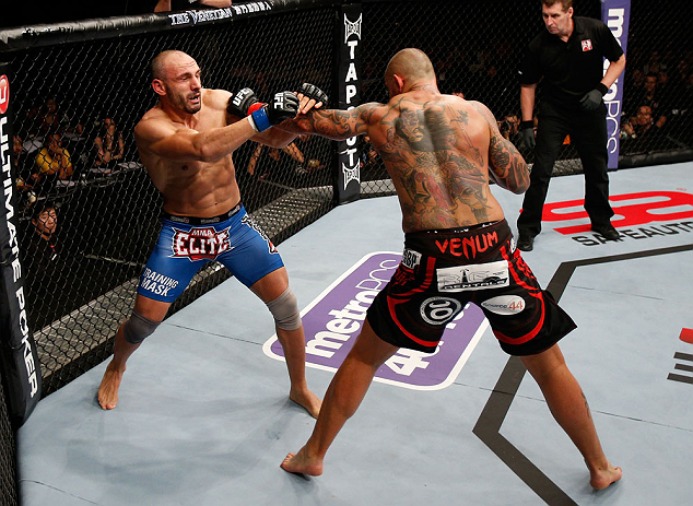 MACAU, MACAU - NOVEMBER 10: (R-L) Thiago Silva punches Stanislav Nedkov during their light heavyweight bout at the UFC Macao event inside CotaiArena on November 10, 2012 in Macau, Macau. (Photo by Josh Hedges/Zuffa LLC/Zuffa LLC via Getty Images)