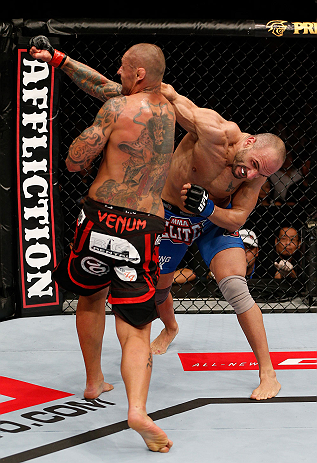 MACAU, MACAU - NOVEMBER 10: (R-L) Stanislav Nedkov knocks down Thiago Silva with a punch during their light heavyweight bout at the UFC Macao event inside CotaiArena on November 10, 2012 in Macau, Macau. (Photo by Josh Hedges/Zuffa LLC/Zuffa LLC via Getty Images)