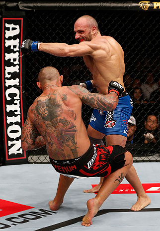 MACAU, MACAU - NOVEMBER 10: (R-L) Stanislav Nedkov knocks down Thiago Silva with a punch during their light heavyweight bout at the UFC Macao event inside CotaiArena on November 10, 2012 in Macau, Macau. (Photo by Josh Hedges/Zuffa LLC/Zuffa LLC via Getty Images)