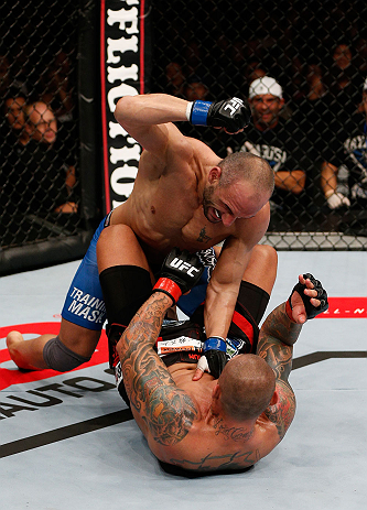 MACAU, MACAU - NOVEMBER 10: (L-R) Stanislav Nedkov punches Thiago Silva during their light heavyweight bout at the UFC Macao event inside CotaiArena on November 10, 2012 in Macau, Macau. (Photo by Josh Hedges/Zuffa LLC/Zuffa LLC via Getty Images)