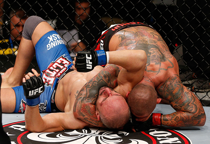 MACAU, MACAU - NOVEMBER 10: (R-L) Thiago Silva secures an arm triangle choke submission against Stanislav Nedkov during their light heavyweight bout at the UFC Macao event inside CotaiArena on November 10, 2012 in Macau, Macau. (Photo by Josh Hedges/Zuffa LLC/Zuffa LLC via Getty Images)