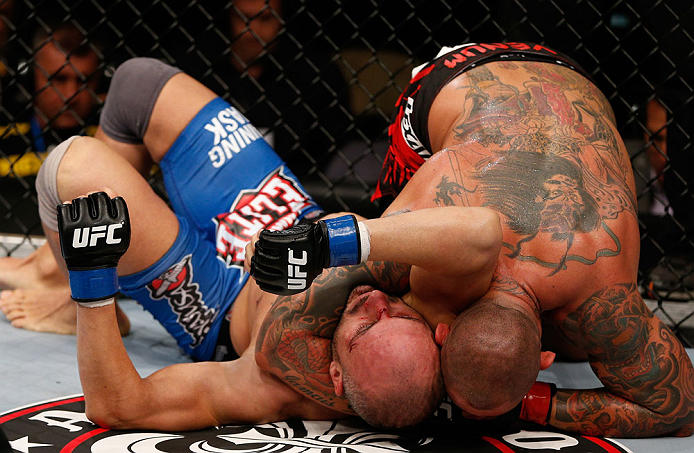 MACAU, MACAU - NOVEMBER 10: (R-L) Thiago Silva secures an arm triangle choke submission against Stanislav Nedkov during their light heavyweight bout at the UFC Macao event inside CotaiArena on November 10, 2012 in Macau, Macau. (Photo by Josh Hedges/Zuffa LLC/Zuffa LLC via Getty Images)