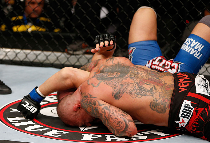 MACAU, MACAU - NOVEMBER 10: (R-L) Thiago Silva secures an arm triangle choke submission against Stanislav Nedkov during their light heavyweight bout at the UFC Macao event inside CotaiArena on November 10, 2012 in Macau, Macau. (Photo by Josh Hedges/Zuffa LLC/Zuffa LLC via Getty Images)
