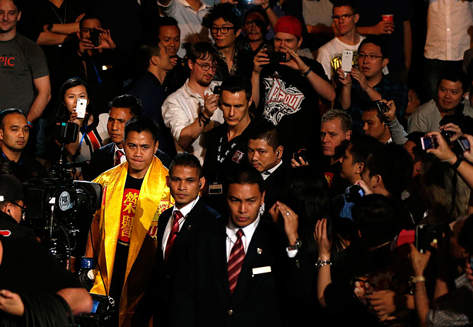 MACAU, MACAU - NOVEMBER 10: Cung Le enters the arena before his middleweight bout against Rich Franklin at the UFC Macao event inside CotaiArena on November 10, 2012 in Macau, Macau. (Photo by Josh Hedges/Zuffa LLC/Zuffa LLC via Getty Images)