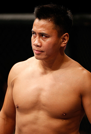 MACAU, MACAU - NOVEMBER 10: Cung Le stands in the Octagon before his middleweight bout against Rich Franklin at the UFC Macao event inside CotaiArena on November 10, 2012 in Macau, Macau. (Photo by Josh Hedges/Zuffa LLC/Zuffa LLC via Getty Images)