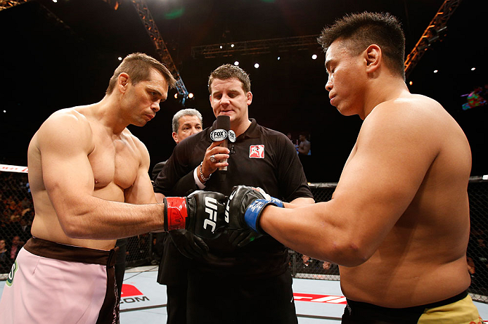 MACAU, MACAU - NOVEMBER 10: Opponents Rich Franklin (L) and Cung Le (R) touch gloves before their middleweight bout at the UFC Macao event inside CotaiArena on November 10, 2012 in Macau, Macau. (Photo by Josh Hedges/Zuffa LLC/Zuffa LLC via Getty Images)