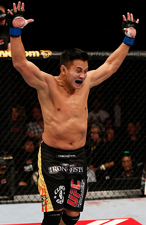 MACAU, MACAU - NOVEMBER 10: Cung Le reacts after knocking out Rich Franklin during their middleweight bout at the UFC Macao event inside CotaiArena on November 10, 2012 in Macau, Macau. (Photo by Josh Hedges/Zuffa LLC/Zuffa LLC via Getty Images)