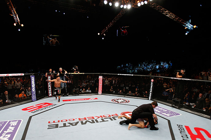 MACAU, MACAU - NOVEMBER 10: Cung Le (L) reacts after knocking out Rich Franklin during their middleweight bout at the UFC Macao event inside CotaiArena on November 10, 2012 in Macau, Macau. (Photo by Josh Hedges/Zuffa LLC/Zuffa LLC via Getty Images)