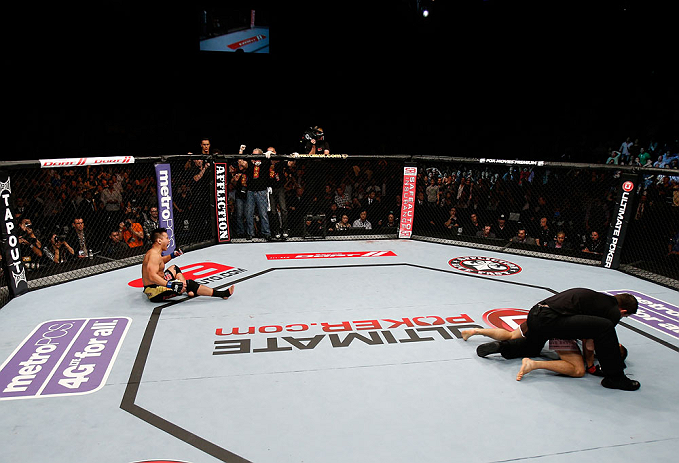 MACAU, MACAU - NOVEMBER 10: Cung Le (L) reacts after knocking out Rich Franklin during their middleweight bout at the UFC Macao event inside CotaiArena on November 10, 2012 in Macau, Macau. (Photo by Josh Hedges/Zuffa LLC/Zuffa LLC via Getty Images)