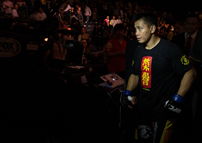 MACAU, MACAU - NOVEMBER 10:  Cung Le exits the arena after knocking out Rich Franklin during their middleweight bout at the UFC Macao event inside CotaiArena on November 10, 2012 in Macau, Macau.  (Photo by Josh Hedges/Zuffa LLC/Zuffa LLC via Getty Images)