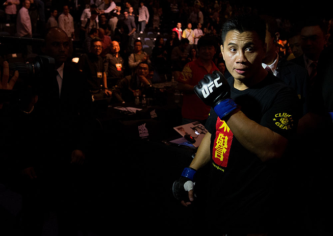 MACAU, MACAU - NOVEMBER 10:  Cung Le exits the arena after knocking out Rich Franklin during their middleweight bout at the UFC Macao event inside CotaiArena on November 10, 2012 in Macau, Macau.  (Photo by Josh Hedges/Zuffa LLC/Zuffa LLC via Getty Images)