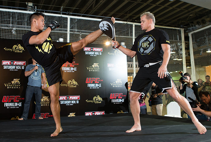 HONG KONG - NOVEMBER 07: Cung Le works out for media and fans during a UFC open workout session at Harbour City Mall on November 7, 2012 in Hong Kong, Hong Kong. (Photo by Josh Hedges/Zuffa LLC/Zuffa LLC via Getty Images)