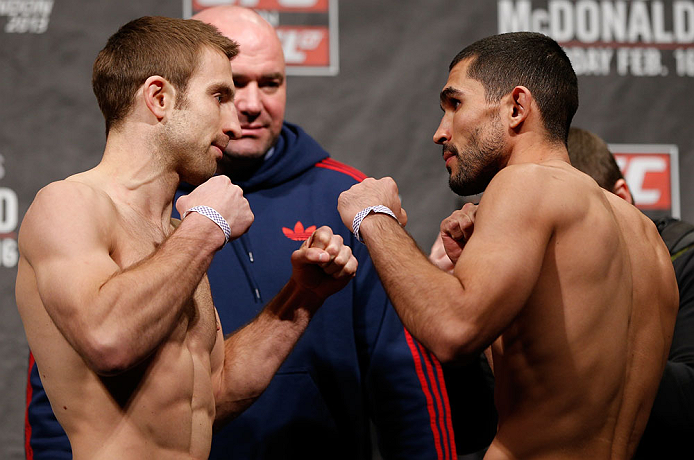 LONDON, ENGLAND - FEBRUARY 15:  (L-R) Opponents Phil Harris and Ulysses Gomez face off during the UFC weigh-in on February 15, 2013 at Wembley Arena in London, England.  (Photo by Josh Hedges/Zuffa LLC/Zuffa LLC via Getty Images)