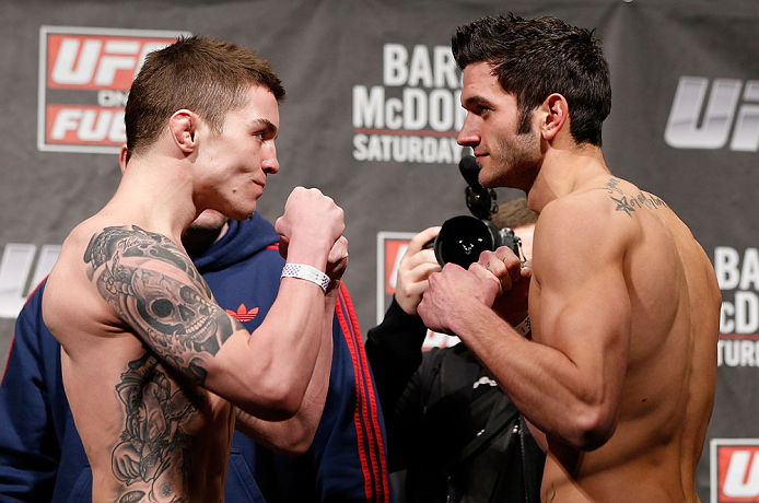 LONDON, ENGLAND - FEBRUARY 15:  (L-R) Opponents Andy Ogle and Josh Grispi face off during the UFC weigh-in on February 15, 2013 at Wembley Arena in London, England.  (Photo by Josh Hedges/Zuffa LLC/Zuffa LLC via Getty Images)