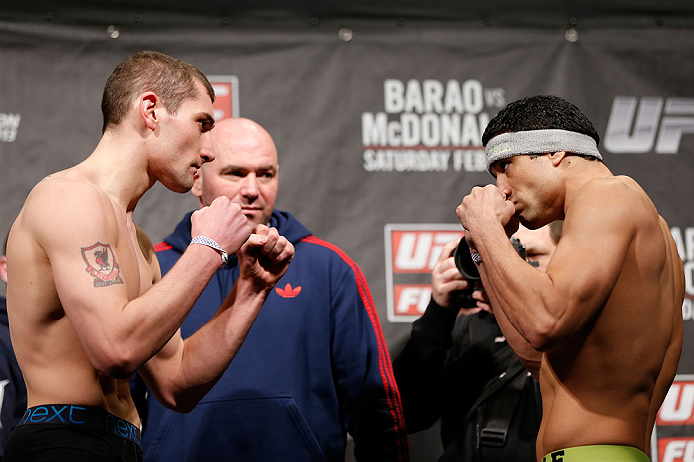 LONDON, ENGLAND - FEBRUARY 15:  (L-R) Opponents Paul Sass and Danny Castillo face off during the UFC weigh-in on February 15, 2013 at Wembley Arena in London, England.  (Photo by Josh Hedges/Zuffa LLC/Zuffa LLC via Getty Images)