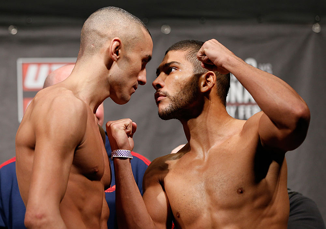 LONDON, ENGLAND - FEBRUARY 15:  (L-R) Opponents Terry Etim and Renee Forte face off during the UFC weigh-in on February 15, 2013 at Wembley Arena in London, England.  (Photo by Josh Hedges/Zuffa LLC/Zuffa LLC via Getty Images)